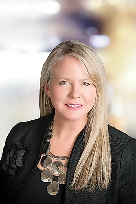 Portrait of Megan Miller-Minderlein, REALTOR® | NRLUX